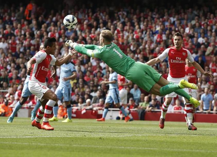 Spettacolo allo stato puro all&#39;Emirates: Arsenal e City fanno 2-2. Quattro gol, tre pali e mille emozioni. Alla fine tutti scontenti. Afp